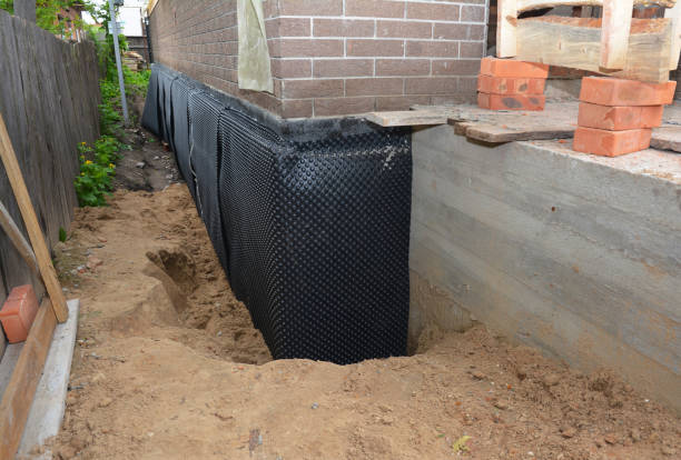Happy homeowners after waterproofing job in Oakford